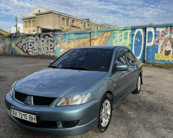 Зелений Міцубісі Lancer, об'ємом двигуна 1.6 л та пробігом 164 тис. км за 6000 $, фото 2 на Automoto.ua