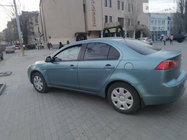 Зелений Міцубісі Lancer, об'ємом двигуна 1.5 л та пробігом 116 тис. км за 7400 $, фото 2 на Automoto.ua