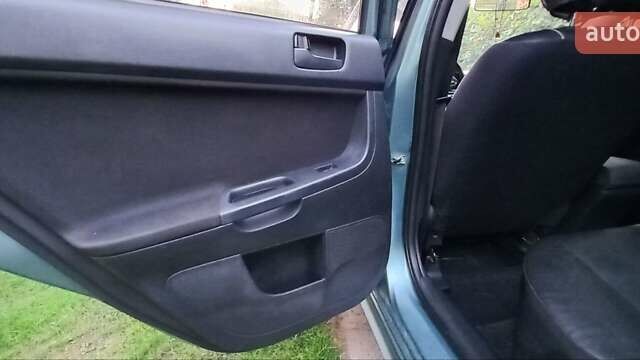 Зелений Міцубісі Lancer, об'ємом двигуна 2 л та пробігом 265 тис. км за 5100 $, фото 13 на Automoto.ua