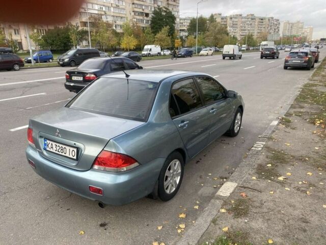 Зеленый Мицубиси Лансер, объемом двигателя 1.6 л и пробегом 167 тыс. км за 3500 $, фото 6 на Automoto.ua