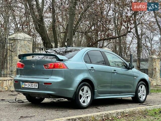 Зелений Міцубісі Lancer, об'ємом двигуна 2 л та пробігом 135 тис. км за 5700 $, фото 15 на Automoto.ua