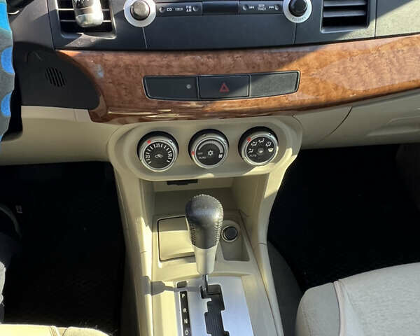 Зелений Міцубісі Lancer, об'ємом двигуна 1.5 л та пробігом 114 тис. км за 7100 $, фото 11 на Automoto.ua