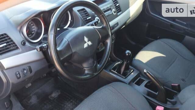 Зелений Міцубісі Lancer, об'ємом двигуна 1.5 л та пробігом 174 тис. км за 5599 $, фото 18 на Automoto.ua