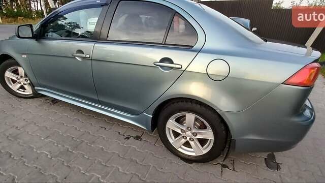 Зелений Міцубісі Lancer, об'ємом двигуна 2 л та пробігом 265 тис. км за 5100 $, фото 4 на Automoto.ua