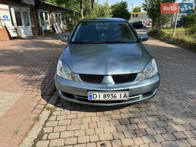 Зеленый Мицубиси Лансер, объемом двигателя 1.6 л и пробегом 137 тыс. км за 5500 $, фото 2 на Automoto.ua