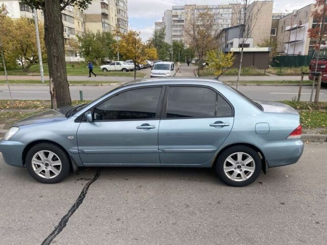 Зеленый Мицубиси Лансер, объемом двигателя 1.6 л и пробегом 167 тыс. км за 3500 $, фото 3 на Automoto.ua