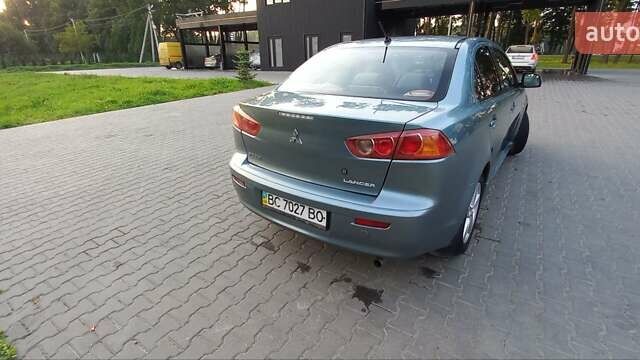Зелений Міцубісі Lancer, об'ємом двигуна 2 л та пробігом 265 тис. км за 5100 $, фото 5 на Automoto.ua