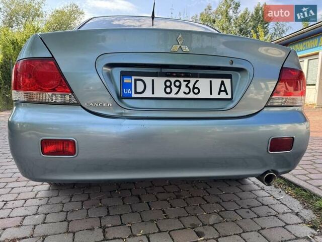 Зеленый Мицубиси Лансер, объемом двигателя 1.6 л и пробегом 137 тыс. км за 5500 $, фото 28 на Automoto.ua