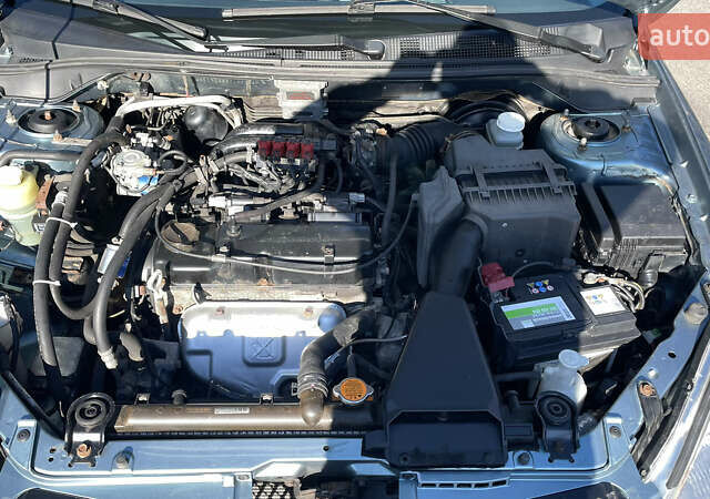 Зеленый Мицубиси Лансер, объемом двигателя 1.58 л и пробегом 180 тыс. км за 4800 $, фото 9 на Automoto.ua