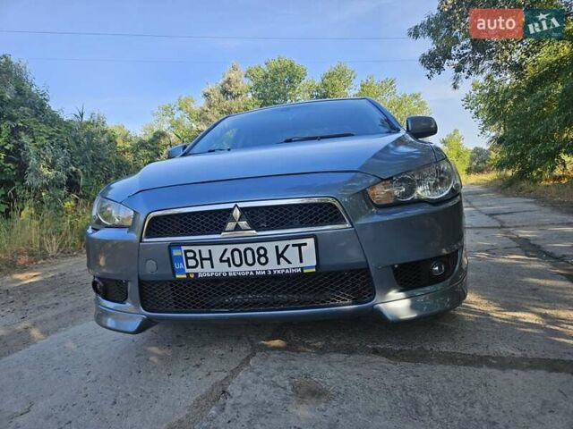 Зелений Міцубісі Lancer, об'ємом двигуна 1.47 л та пробігом 215 тис. км за 5000 $, фото 12 на Automoto.ua