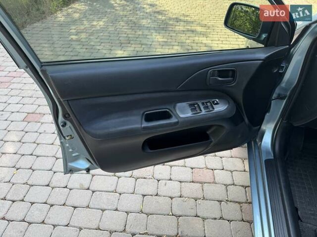 Зеленый Мицубиси Лансер, объемом двигателя 1.6 л и пробегом 137 тыс. км за 5500 $, фото 23 на Automoto.ua