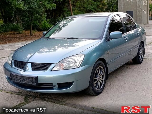 Зеленый Мицубиси Лансер, объемом двигателя 1.6 л и пробегом 187 тыс. км за 4999 $, фото 1 на Automoto.ua