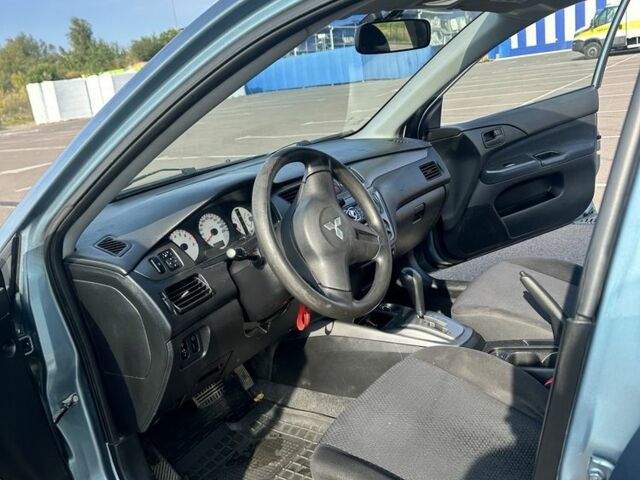 Зелений Міцубісі Lancer, об'ємом двигуна 1.6 л та пробігом 255 тис. км за 3800 $, фото 6 на Automoto.ua