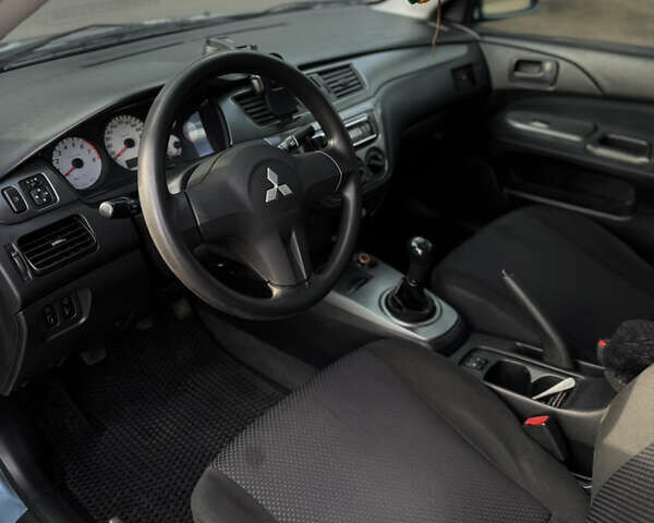 Зелений Міцубісі Lancer, об'ємом двигуна 1.6 л та пробігом 164 тис. км за 6000 $, фото 9 на Automoto.ua
