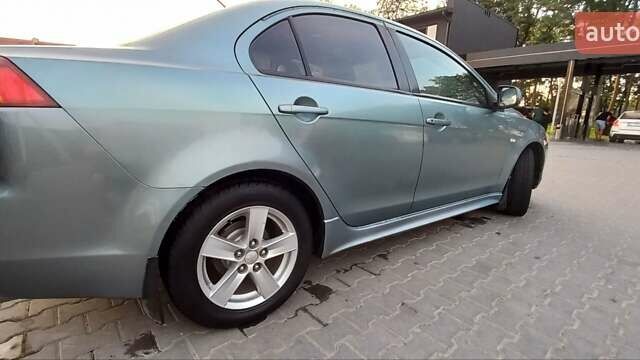 Зелений Міцубісі Lancer, об'ємом двигуна 2 л та пробігом 265 тис. км за 5100 $, фото 8 на Automoto.ua