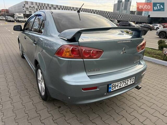 Зеленый Мицубиси Лансер, объемом двигателя 2 л и пробегом 177 тыс. км за 7200 $, фото 5 на Automoto.ua