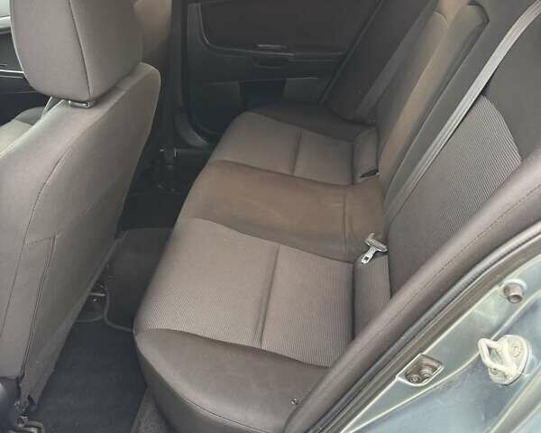 Зеленый Мицубиси Лансер, объемом двигателя 2 л и пробегом 177 тыс. км за 7200 $, фото 14 на Automoto.ua