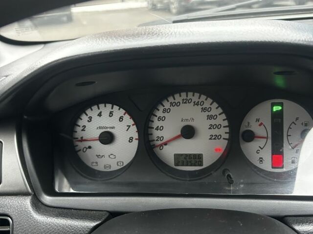 Зеленый Мицубиси Лансер, объемом двигателя 1.6 л и пробегом 234 тыс. км за 5300 $, фото 7 на Automoto.ua