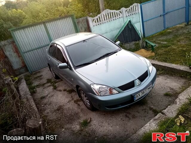 Зеленый Мицубиси Лансер, объемом двигателя 1.6 л и пробегом 176 тыс. км за 4800 $, фото 1 на Automoto.ua