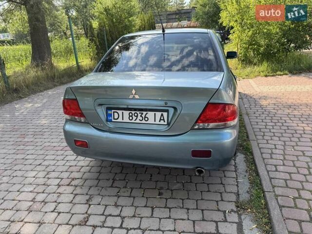 Зеленый Мицубиси Лансер, объемом двигателя 1.6 л и пробегом 137 тыс. км за 5500 $, фото 8 на Automoto.ua