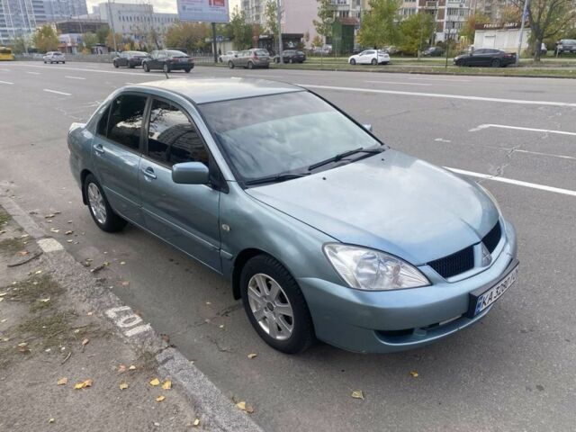 Зеленый Мицубиси Лансер, объемом двигателя 1.6 л и пробегом 167 тыс. км за 3500 $, фото 2 на Automoto.ua