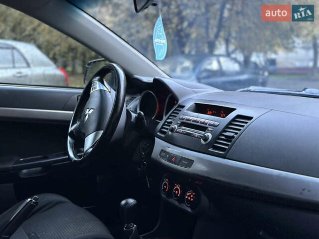 Зеленый Мицубиси Лансер, объемом двигателя 1.5 л и пробегом 260 тыс. км за 3850 $, фото 5 на Automoto.ua