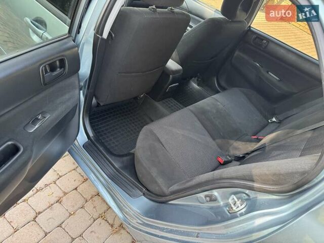 Зеленый Мицубиси Лансер, объемом двигателя 1.6 л и пробегом 137 тыс. км за 5500 $, фото 21 на Automoto.ua