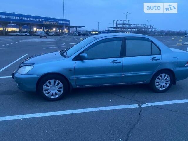 Зелений Міцубісі Lancer, об'ємом двигуна 1.6 л та пробігом 325 тис. км за 4200 $, фото 6 на Automoto.ua