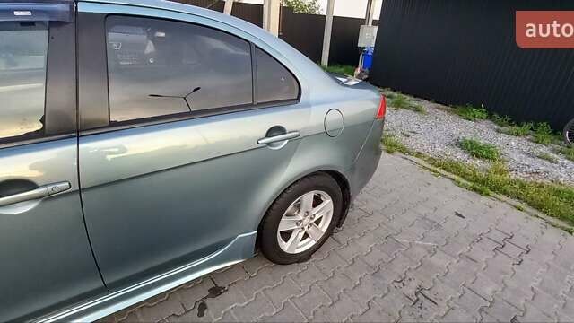Зелений Міцубісі Lancer, об'ємом двигуна 2 л та пробігом 265 тис. км за 5100 $, фото 10 на Automoto.ua