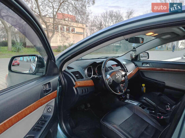 Зелений Міцубісі Lancer, об'ємом двигуна 1.5 л та пробігом 215 тис. км за 5900 $, фото 10 на Automoto.ua