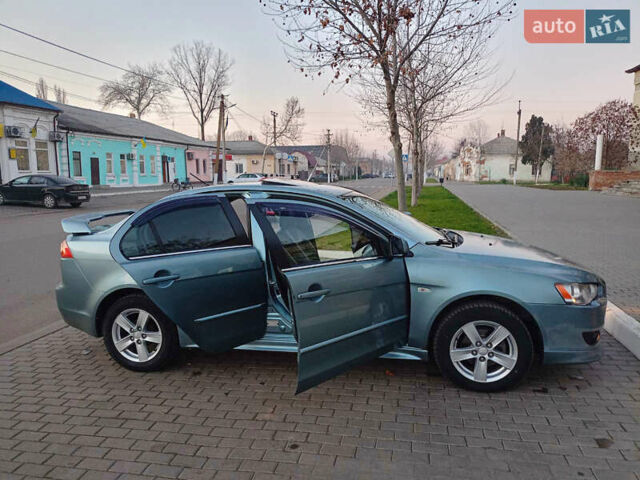 Зелений Міцубісі Lancer, об'ємом двигуна 1.5 л та пробігом 215 тис. км за 5900 $, фото 8 на Automoto.ua