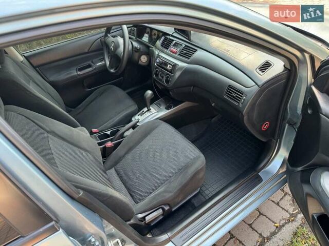 Зеленый Мицубиси Лансер, объемом двигателя 1.6 л и пробегом 137 тыс. км за 5500 $, фото 13 на Automoto.ua