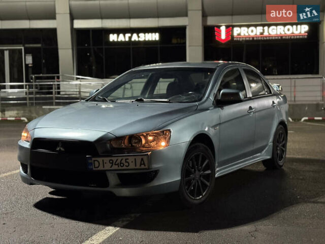 Зеленый Мицубиси Лансер, объемом двигателя 1.5 л и пробегом 260 тыс. км за 3750 $, фото 1 на Automoto.ua
