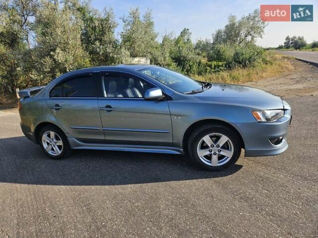 Зелений Міцубісі Lancer, об'ємом двигуна 1.47 л та пробігом 215 тис. км за 5000 $, фото 6 на Automoto.ua