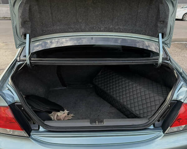 Зелений Міцубісі Lancer, об'ємом двигуна 1.6 л та пробігом 164 тис. км за 6000 $, фото 10 на Automoto.ua