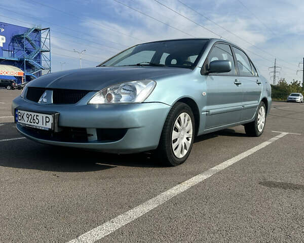 Зелений Міцубісі Lancer, об'ємом двигуна 1.58 л та пробігом 255 тис. км за 3700 $, фото 1 на Automoto.ua