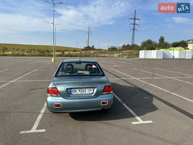 Зелений Міцубісі Lancer, об'ємом двигуна 1.58 л та пробігом 255 тис. км за 3700 $, фото 3 на Automoto.ua