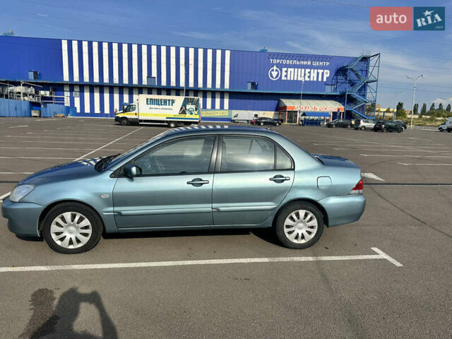 Зелений Міцубісі Lancer, об'ємом двигуна 1.58 л та пробігом 255 тис. км за 3700 $, фото 2 на Automoto.ua