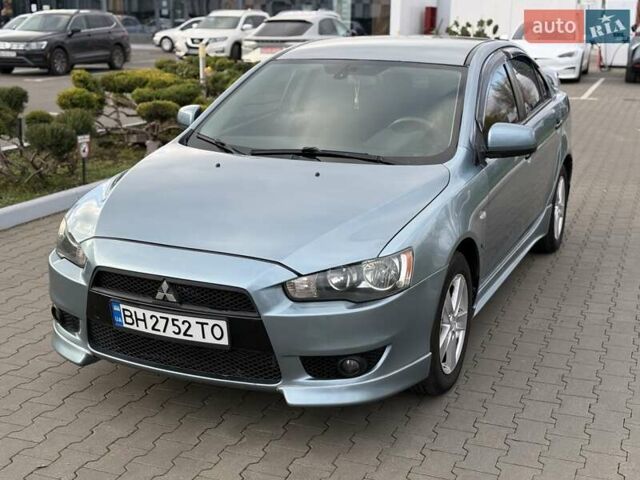 Зеленый Мицубиси Лансер, объемом двигателя 2 л и пробегом 177 тыс. км за 7200 $, фото 4 на Automoto.ua