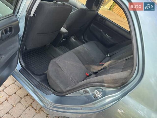 Зеленый Мицубиси Лансер, объемом двигателя 1.6 л и пробегом 137 тыс. км за 5500 $, фото 22 на Automoto.ua