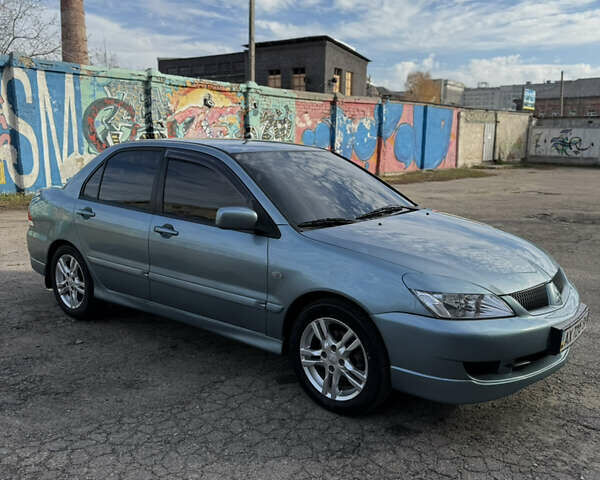 Зелений Міцубісі Lancer, об'ємом двигуна 1.6 л та пробігом 164 тис. км за 6000 $, фото 3 на Automoto.ua