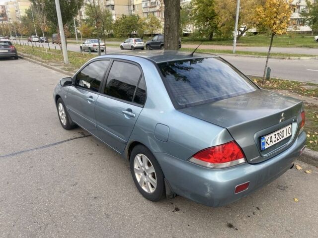 Зеленый Мицубиси Лансер, объемом двигателя 1.6 л и пробегом 167 тыс. км за 3500 $, фото 5 на Automoto.ua