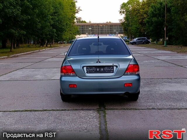 Зеленый Мицубиси Лансер, объемом двигателя 1.6 л и пробегом 187 тыс. км за 4999 $, фото 4 на Automoto.ua