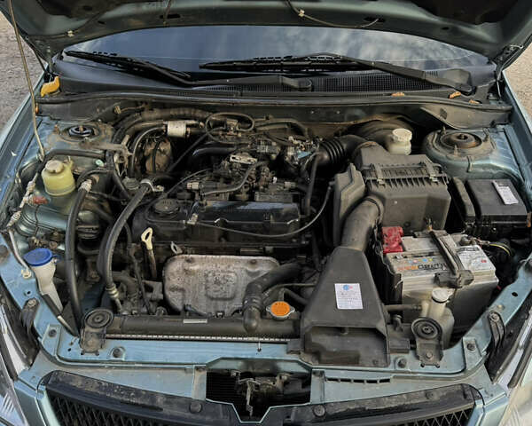 Зелений Міцубісі Lancer, об'ємом двигуна 1.6 л та пробігом 164 тис. км за 6000 $, фото 12 на Automoto.ua