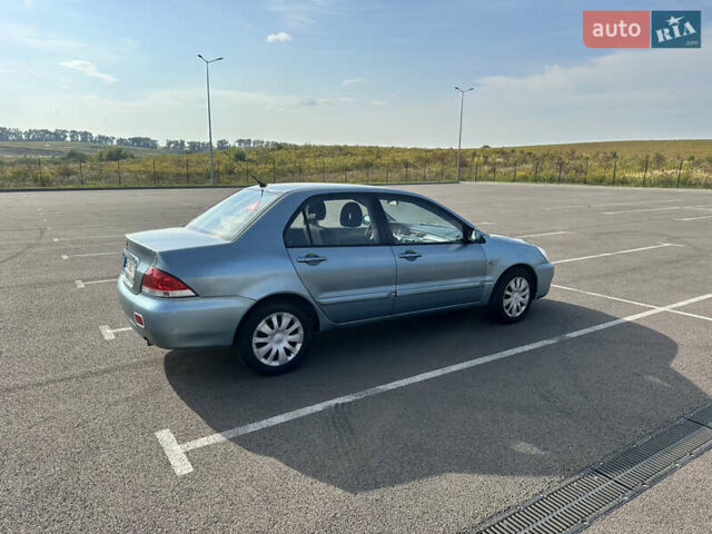 Зелений Міцубісі Lancer, об'ємом двигуна 1.58 л та пробігом 255 тис. км за 3700 $, фото 4 на Automoto.ua