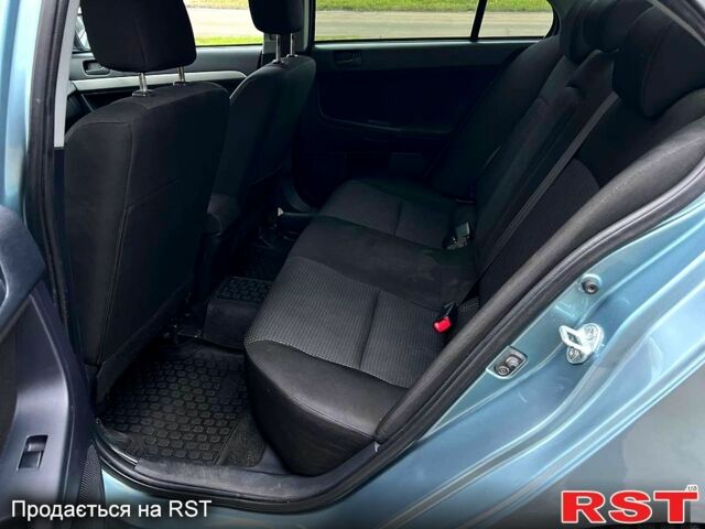 Зеленый Мицубиси Лансер, объемом двигателя 2 л и пробегом 128 тыс. км за 5777 $, фото 7 на Automoto.ua