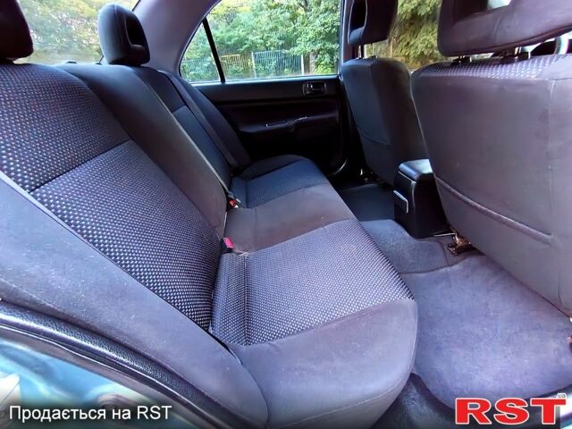 Зеленый Мицубиси Лансер, объемом двигателя 1.6 л и пробегом 187 тыс. км за 4999 $, фото 7 на Automoto.ua