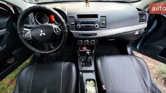 Зелений Міцубісі Lancer, об'ємом двигуна 2 л та пробігом 265 тис. км за 5100 $, фото 2 на Automoto.ua