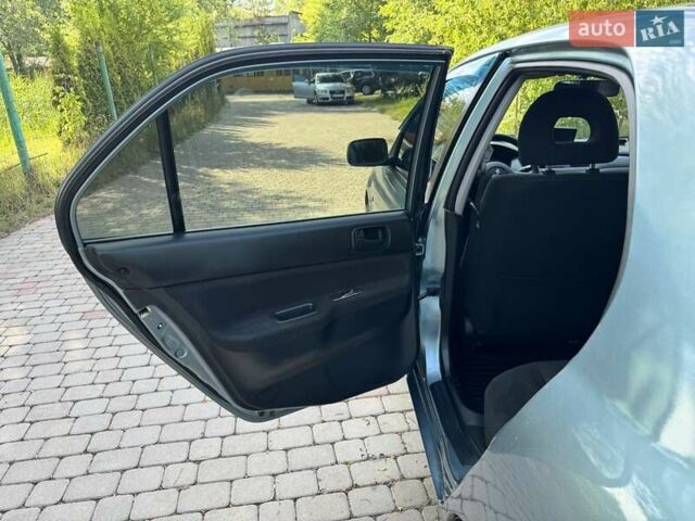 Зеленый Мицубиси Лансер, объемом двигателя 1.6 л и пробегом 137 тыс. км за 5500 $, фото 20 на Automoto.ua