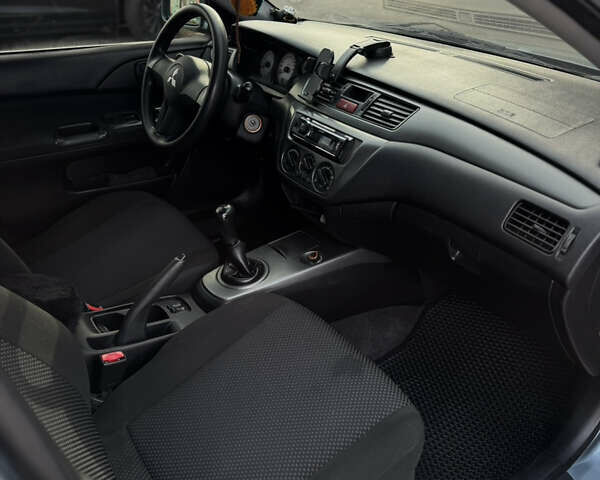 Зелений Міцубісі Lancer, об'ємом двигуна 1.6 л та пробігом 164 тис. км за 6000 $, фото 7 на Automoto.ua